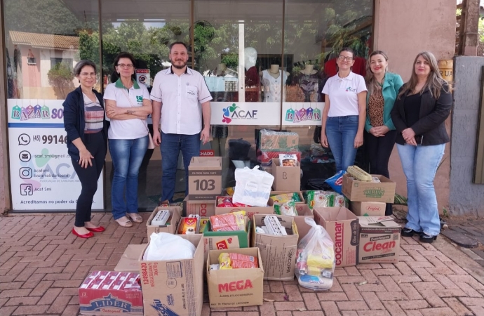 ACISMI entrega quase meia tonelada de alimentos comprados com dinheiro arrecadado no Interfirmas para a ACAF