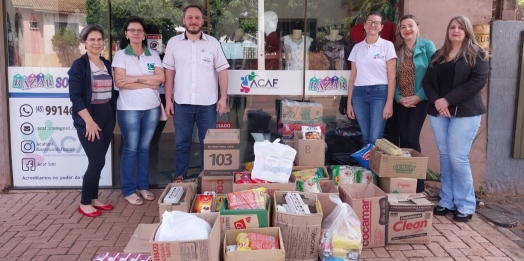 ACISMI entrega quase meia tonelada de alimentos comprados com dinheiro arrecadado no Interfirmas para a ACAF
